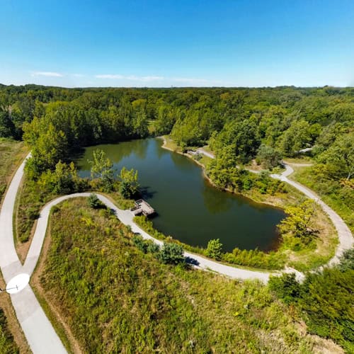 Boone County scenic lake with walking trails and lush greenery in Indiana.