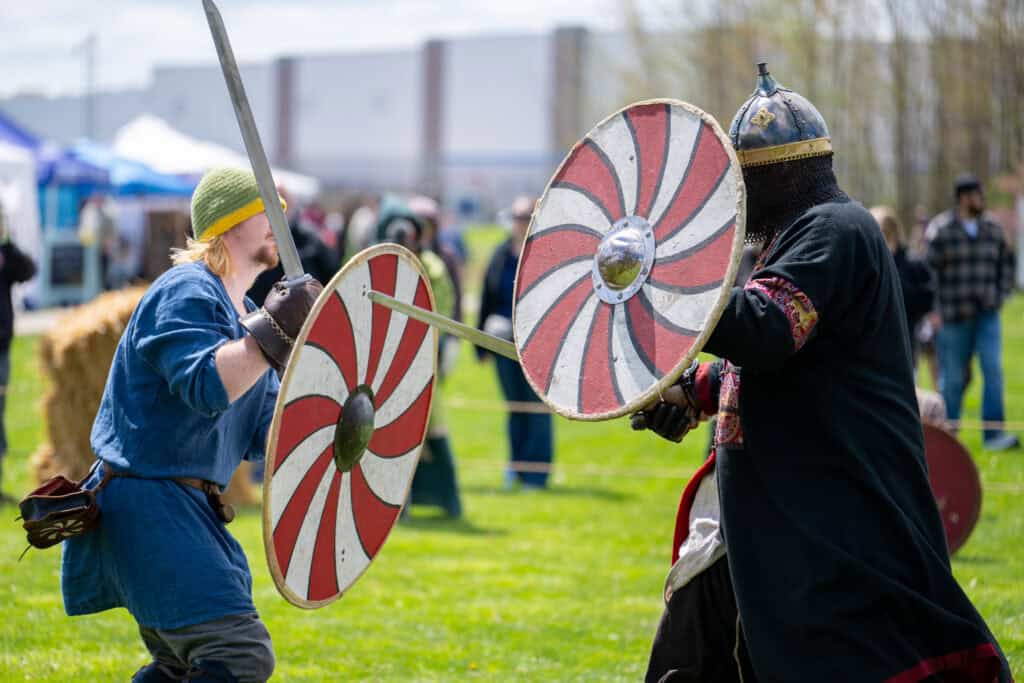 Battle reenactment at Whitestown Viking fest.